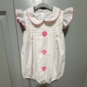 White pleated bubble with pink shell detail